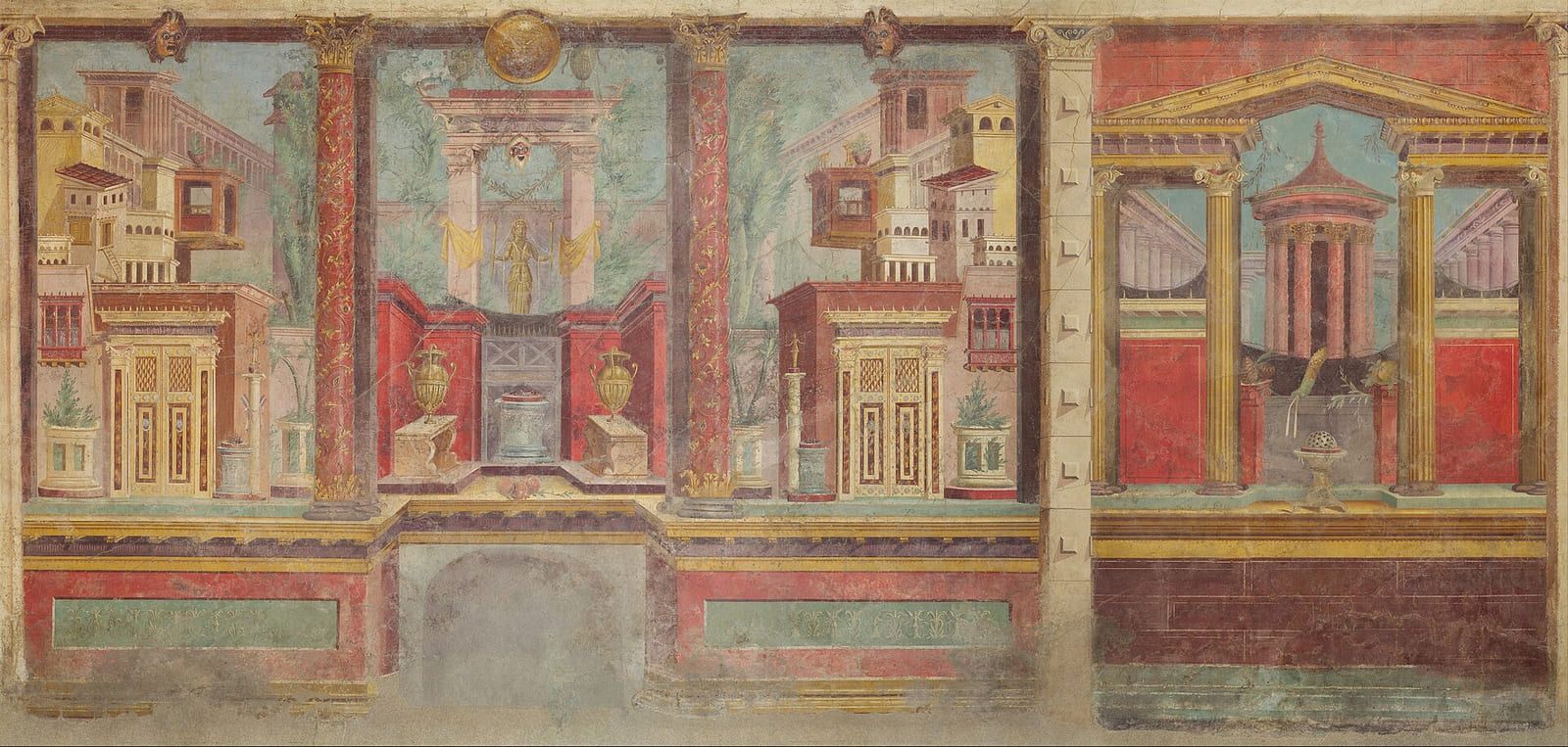 A long band of painted architecture above a dado, running the width of the wall in red, ochre and black