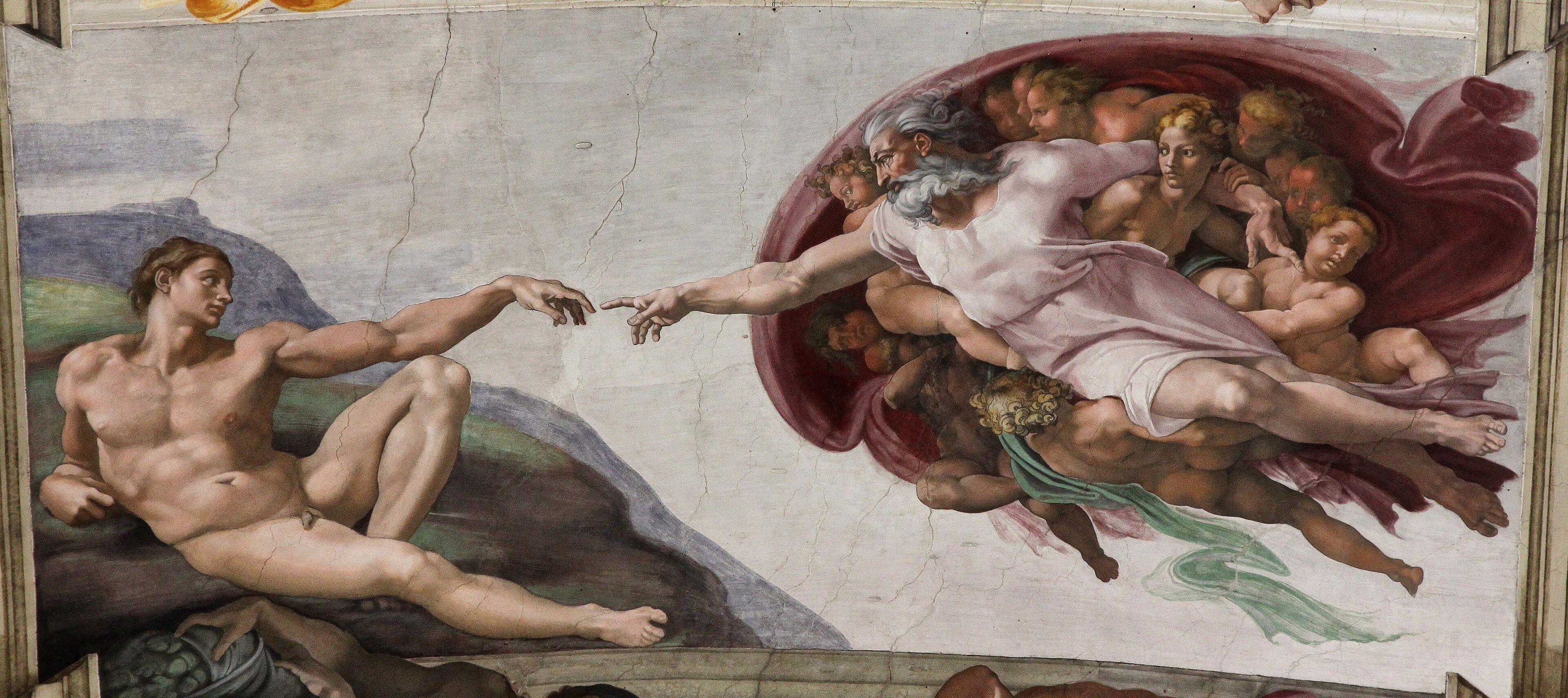 A reclining nude Adam reaches out to touch the finger of God, who is borne aloft in a red cloak among angels
