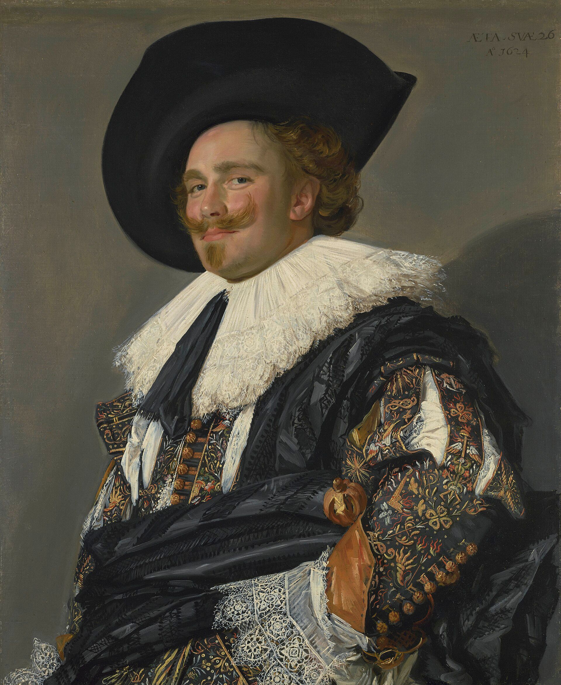 A young man in a wide black hat and embroidered sleeve turning to the viewer above a broad white ruff, his moustache tipped up