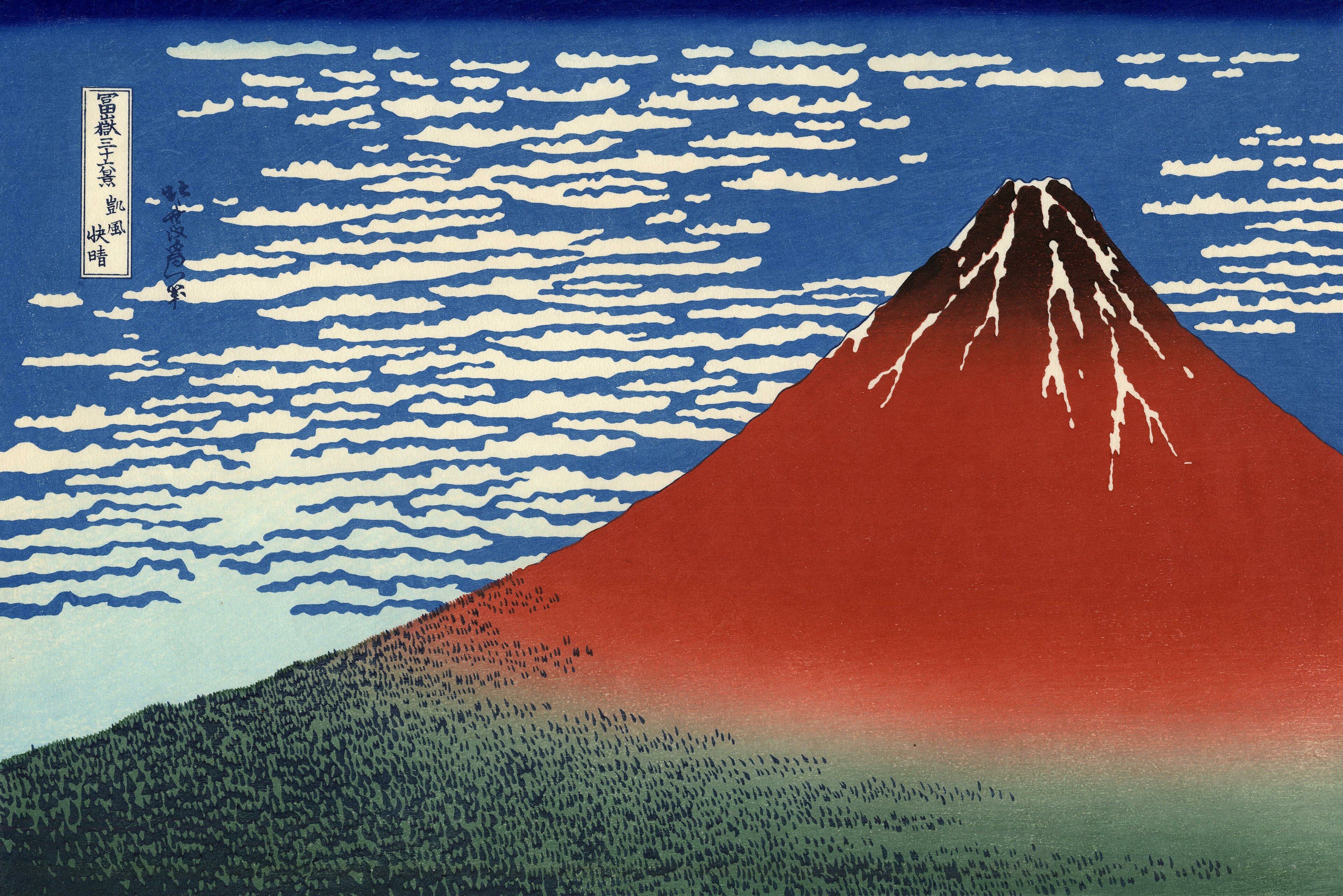 A vermilion Mount Fuji rises against deep blue sky with rows of white cloud along its base