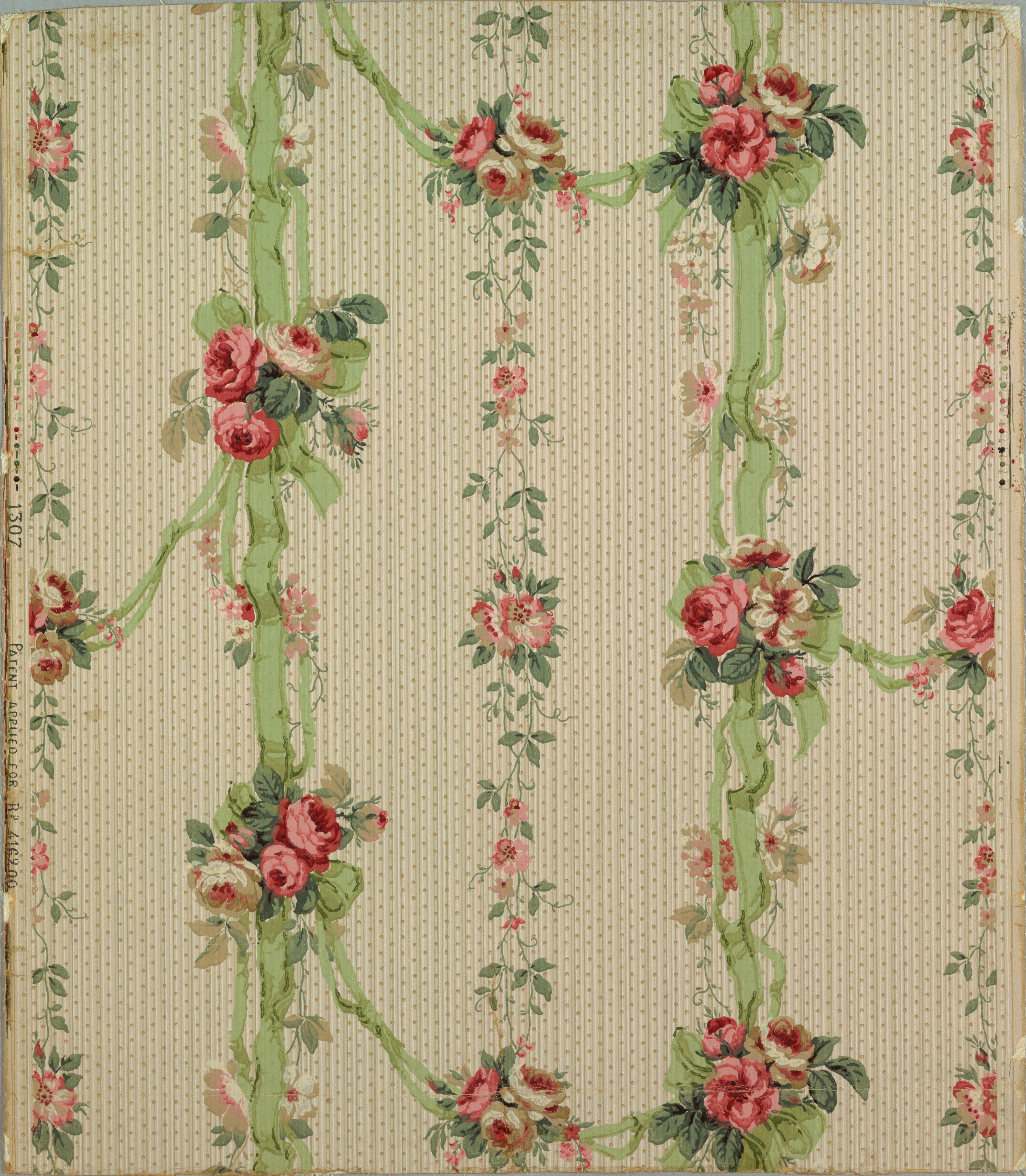 Vertical green ribbons hung with swags and clusters of pink roses, running over a finely striped and dotted cream ground