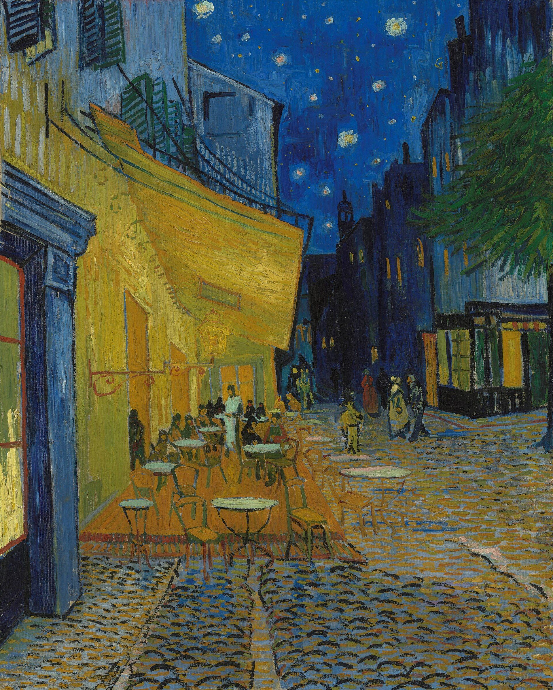 A cafe terrace under a yellow awning spilling light onto blue cobbles, tables and figures below a deep blue sky full of stars